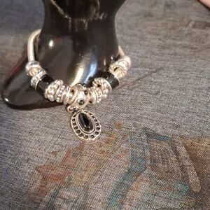 Elegant Silver Toned and Black Charm Bracelet